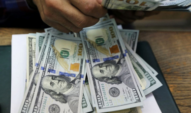 Notícia - Dólar fecha estável, mas acumula alta de 1,86% na semana