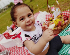 Notícia - Esther completa um ano, a primeira a nascer no Hospital Materno Infantil