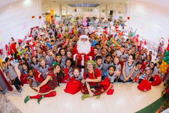 Notícia - Crianças carentes ganham festa e presentes de Natal