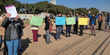 Notícia - Moradores protestam pela manutenção do traçado de avenida em Vila Esperança