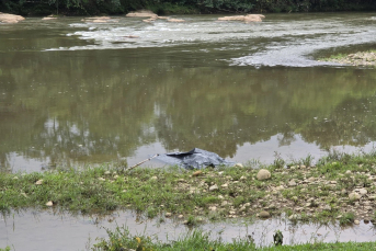 Notícia - Corpo é encontrado em rio de Orleans