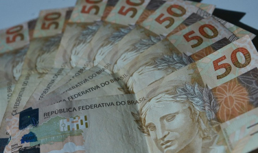 Notícia - Auxílio emergencial é publicado e governo abre crédito de R$ 98 bi